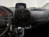 dashboard view of a car with steering wheel and dashboard controls