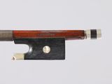 an image of a violin bow with a wooden handle on a white background