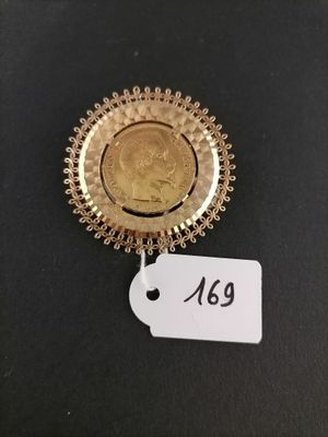 a gold coin with a price tag attached to it