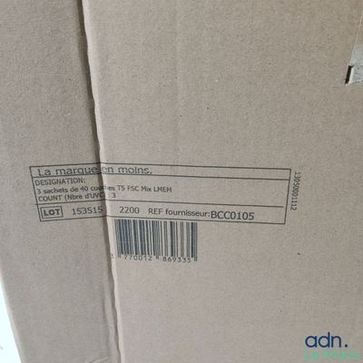 the back of a cardboard box with a barcode on it