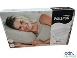 a box with a picture of a woman laying on a pillow