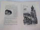 an open book with a picture of a castle and a clock tower