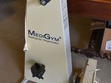 a machine that is sitting on the floor next to a table