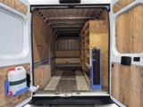 a white van that has a door open and some shelves in the back