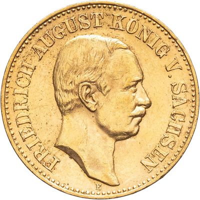an image of a gold coin with a man ' s face on it