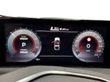 the dashboard of a car with a digital display on it