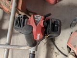 an image of a couple of tools that are sitting on the ground
