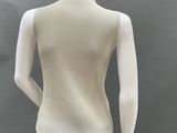 a mannequin mannequin wearing a white top and black pants