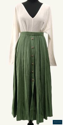 green skirt with buttons and a white shirt on a mannequin mannequin mannequin mannequin mannequin mannequin mannequin mann