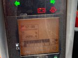 a close up of a car ' s dashboard with a clock on it