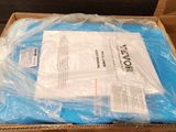 a box with a blue shirt in it on the floor