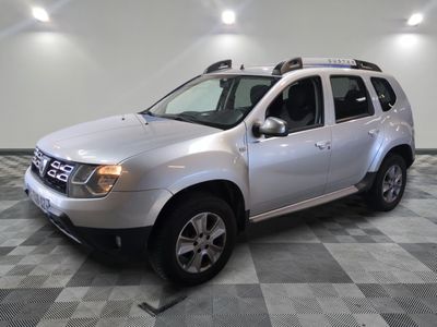 a picture of a silver suv parked in a garage
