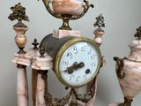 a clock that is sitting on top of a table