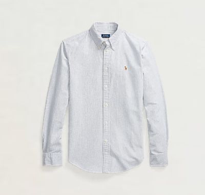 a white shirt with a blue and white stripe pattern on it