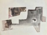 une photo d'une feuille de papier découpée en morceaux