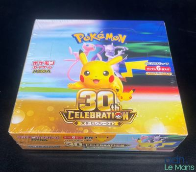 the box of the pokemon card game has been opened and ready to be played