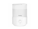 une photo d'un humidificateur blanc posé sur une table blanche