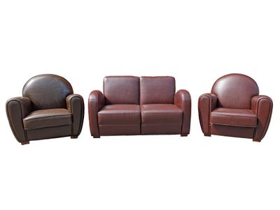 three pieces of leather furniture including a reclining chair, a reclining chair and a reclining chair