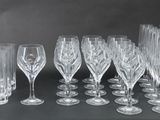 a lot of empty wine glasses on the table