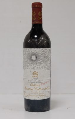 a bottle of wine that is sitting on a table