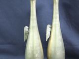 pair of antique brass vases with angel wings on each of them