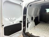 a white van with the door open and the back door open
