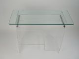 a clear table with a glass top on a white background