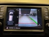a picture of a car ' s rear view camera in a vehicle
