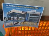 a sign on the ceiling advertising a new car wash