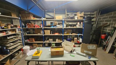 a table with a bunch of items on it in a room