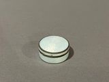 a close up of a coin sitting on top of a table
