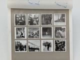 an old black and white photo of a group of people in a city