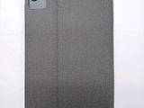 the back of a gray case with a camera attached to it