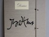 a close up of a book with writing on the cover