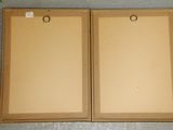 pair of unfinished wood picture frames with hangers on them