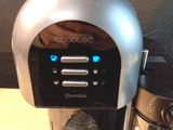 a coffee maker that is sitting on a table
