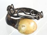 a picture of a ring with a stone on it