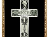 a black and white photo of a cross made out of money