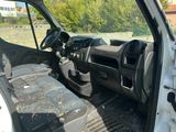 a picture of the inside of a truck with the driver ' s seat down
