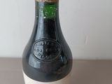 a bottle of wine that is sitting on a table