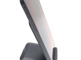 a cell phone that is sitting on top of a stand