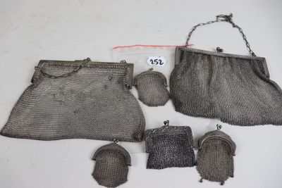 an image of a group of metal mesh purses on a table