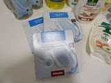 many different types of hand sanitizers on the counter