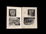 a book opened to show pictures of a plate of food