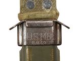 a close up of a belt with a us army badge on it