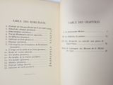 an open book that has a list of tables on it