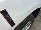 a close up of a sticker on the hood of a car
