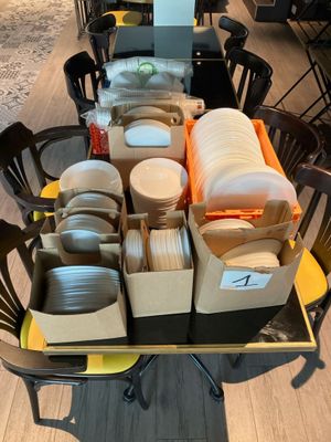 a table with a lot of plates and bowls on it