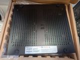 a box with a laptop inside of it on a table
