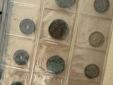 a book with a bunch of coins inside of it
